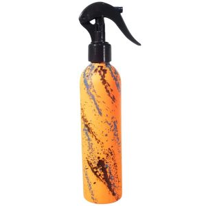 Atomizador profesional modelo PB con cuerpo naranja neón y diseño de salpicaduras artísticas en color oscuro.