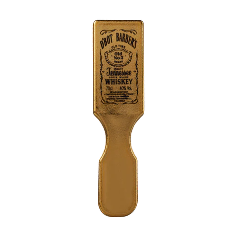 Cepillo de limpieza profesional Jack Daniels con acabado dorado y diseño clásico grabado.