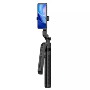 Trípode C12 abierto sobre una mesa con soporte para celular y control remoto.