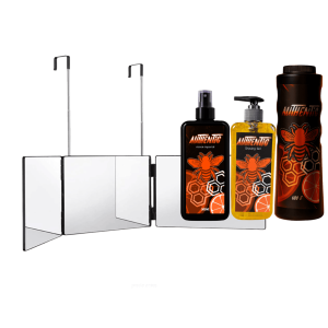 Espejo de autocorte 360 grados junto a los productos de gran formato Vision Imperial: gel de afeitar, after shave y talco naranja. Leyenda: Energía Cítrica y Visión Total: El combo grande Vision Imperial para un estilo impecable.