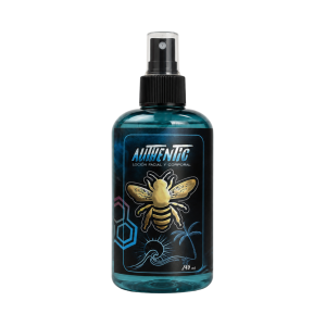 Locion facial y corporal Aureus Blue de Authentic en envase de 245 ml con atomizador negro y etiqueta con abeja dorada sobre fondo negro.